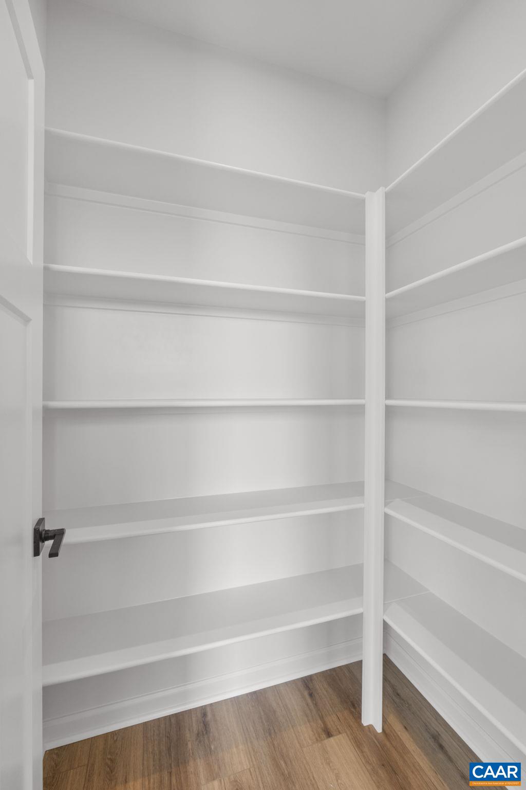2209 Woodburn Road Charlottesville, VA 22901 - Photo 24 of 41 a view of walk in closet with empty racks