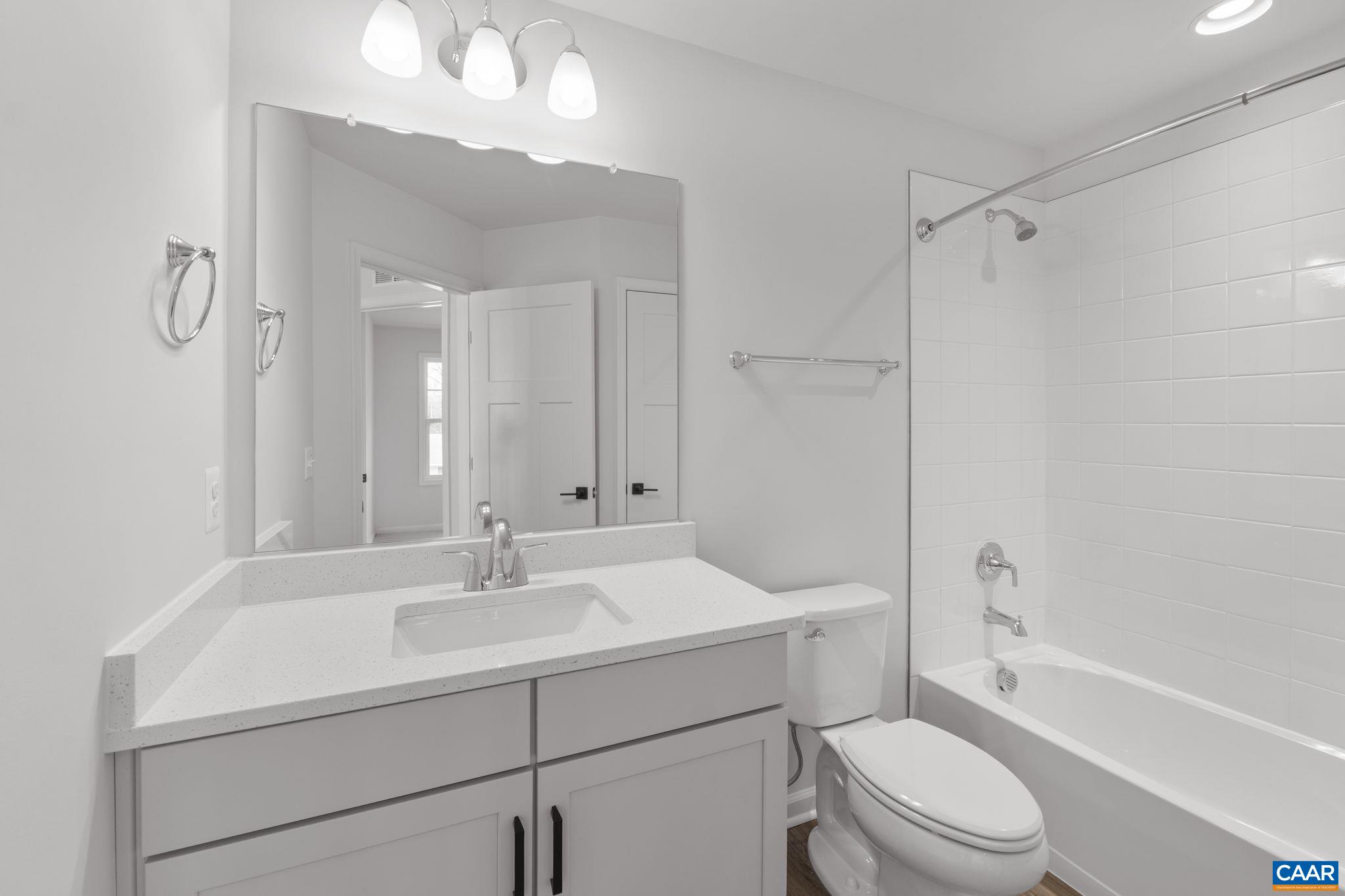 2209 Woodburn Road Charlottesville, VA 22901 - Photo 31 of 41 a bathroom with a sink a toilet and shower