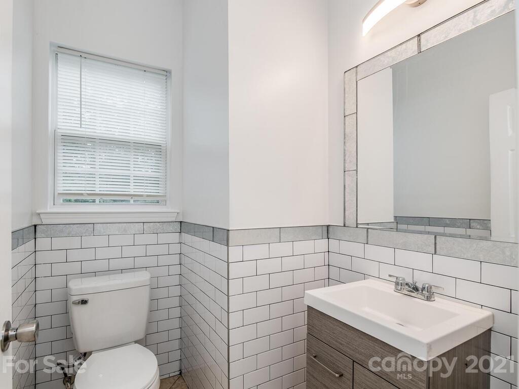 1108 Hannah Rae Court Charlotte, NC 28214 - Photo 11 of 16 a bathroom with a sink toilet and mirror