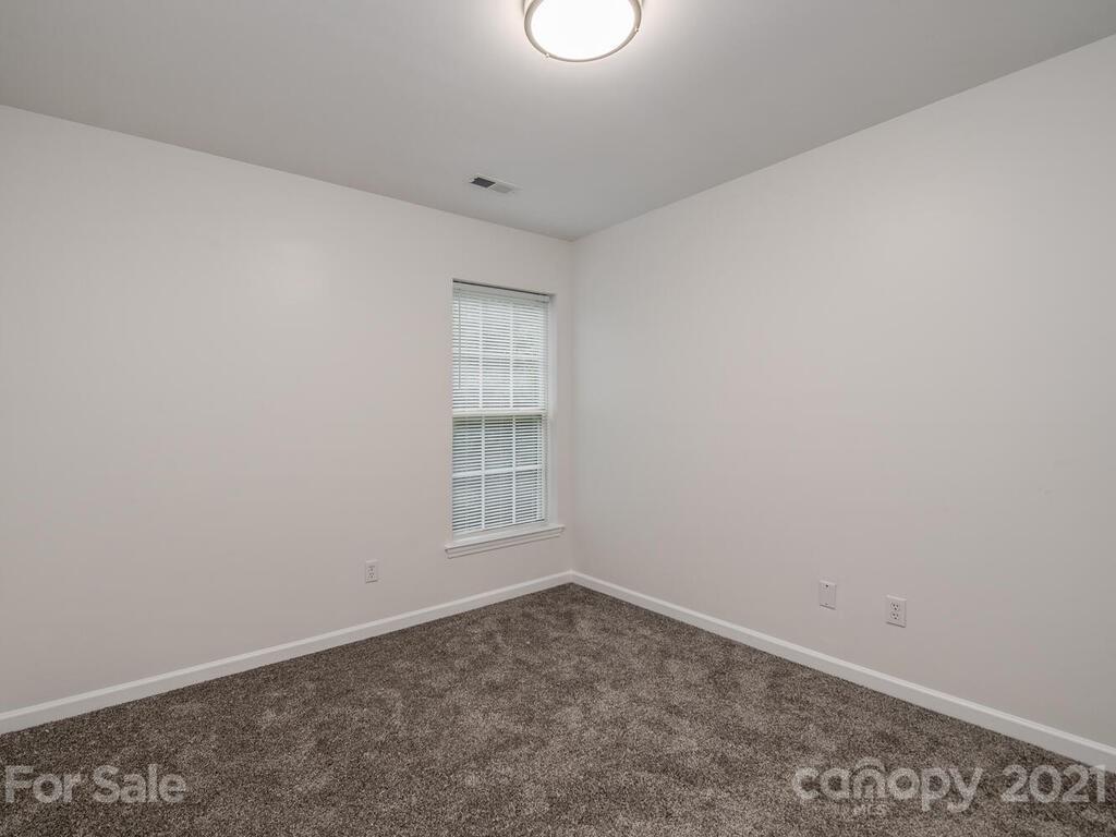 1108 Hannah Rae Court Charlotte, NC 28214 - Photo 14 of 16 an empty room with windows