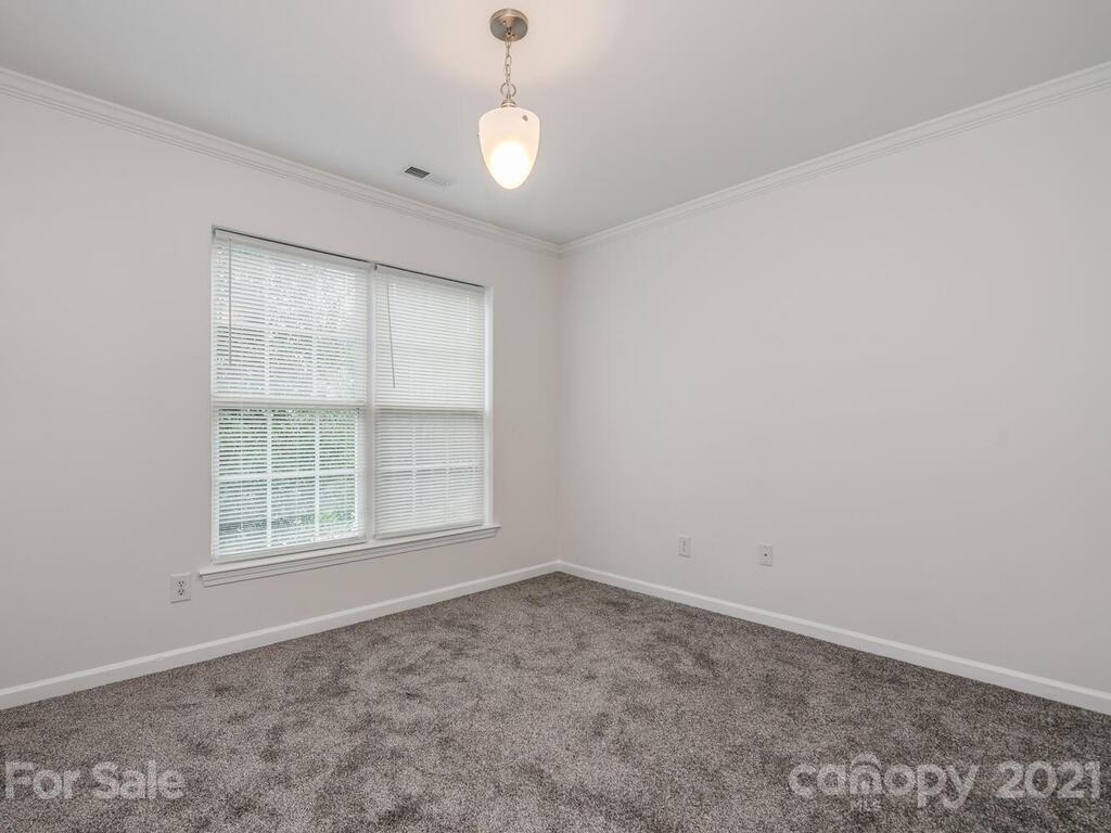 1108 Hannah Rae Court Charlotte, NC 28214 - Photo 15 of 16 an empty room with a empty space and a window