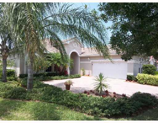 7642 Desert Inn Way Lakewood Ranch, FL 34202 - Photo 1 of 1 a view of front of a house with a yard