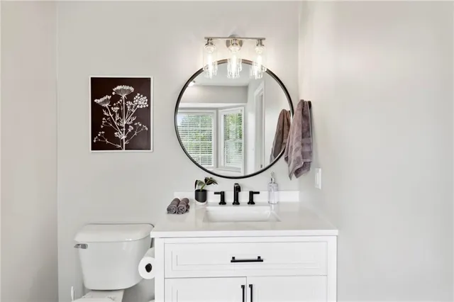 a white bath tub sitting next to a window