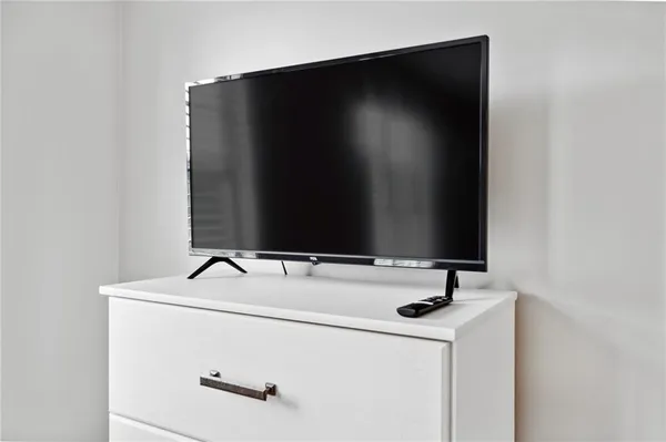a bathroom with a sink and vanity