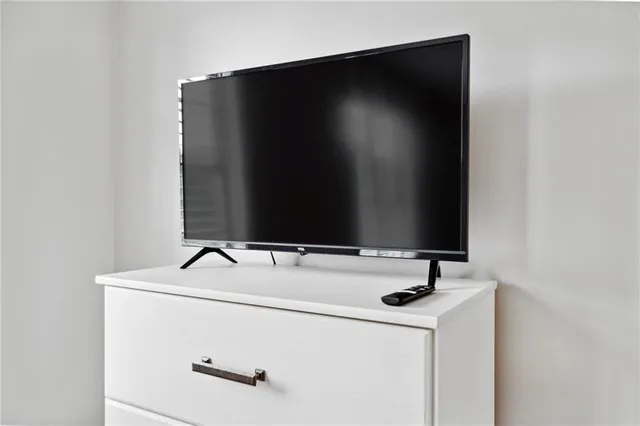 a bathroom with a sink and vanity