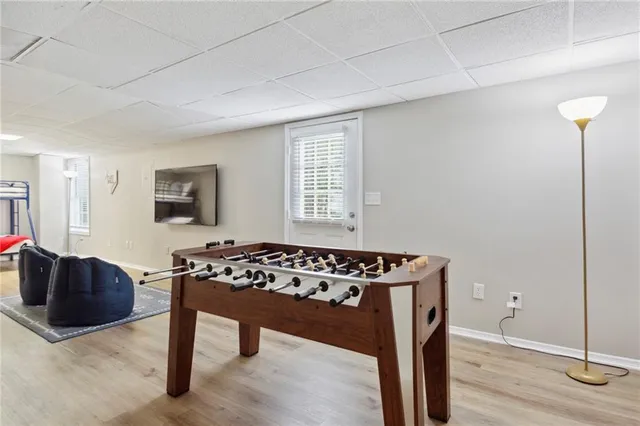 a bedroom with a bed and a desk