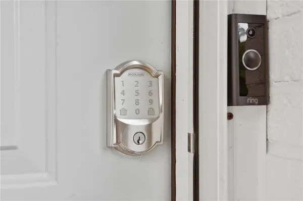 a view of storage and utility room with washer and dryer