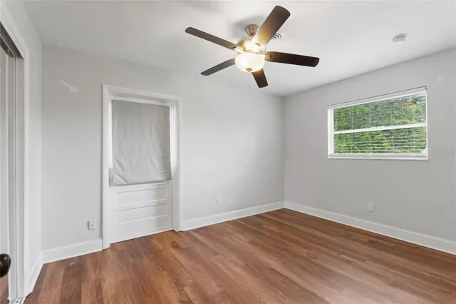 a bathroom with a sink toilet a mirror and shower