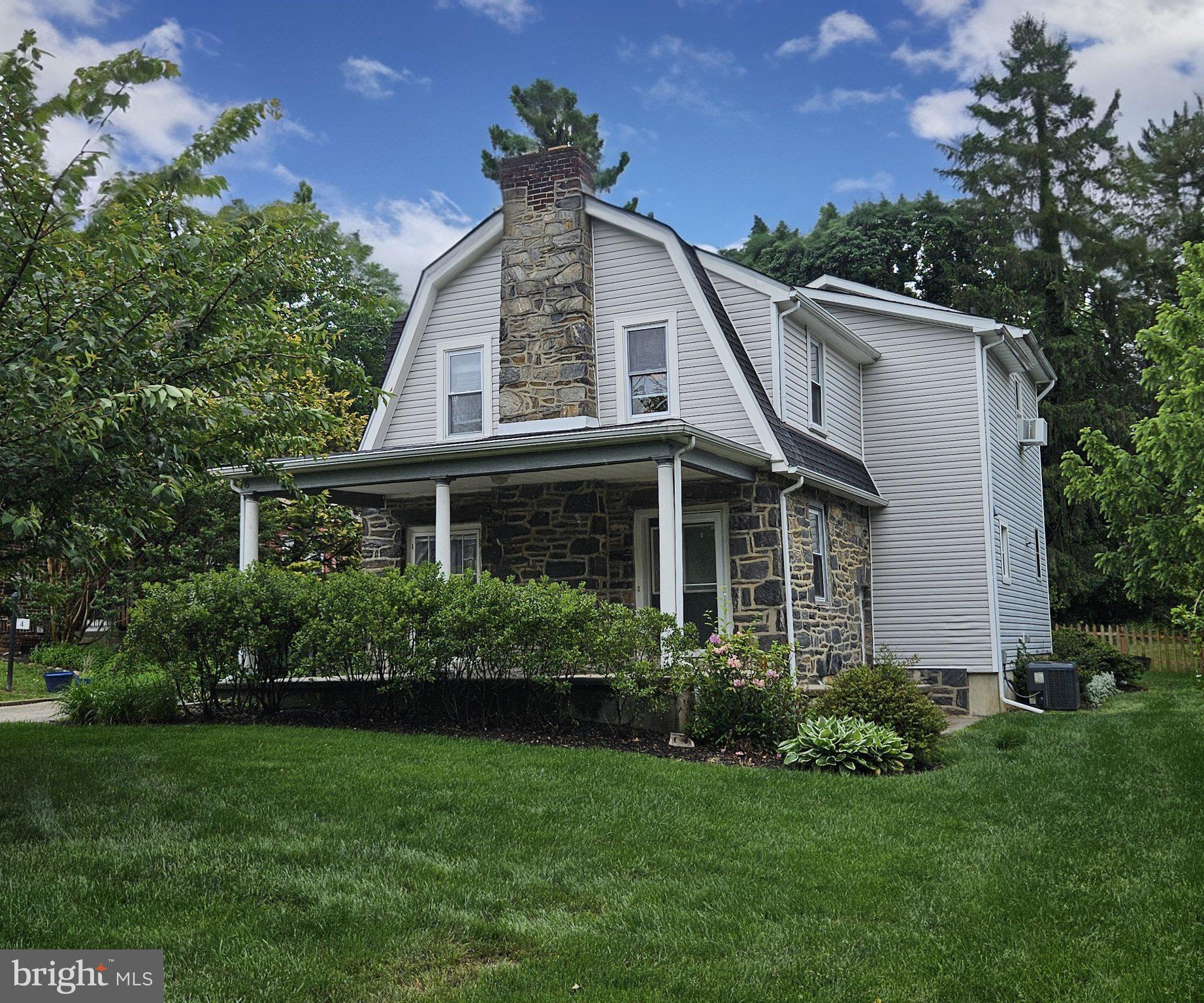 Charming stone-front home in nature.