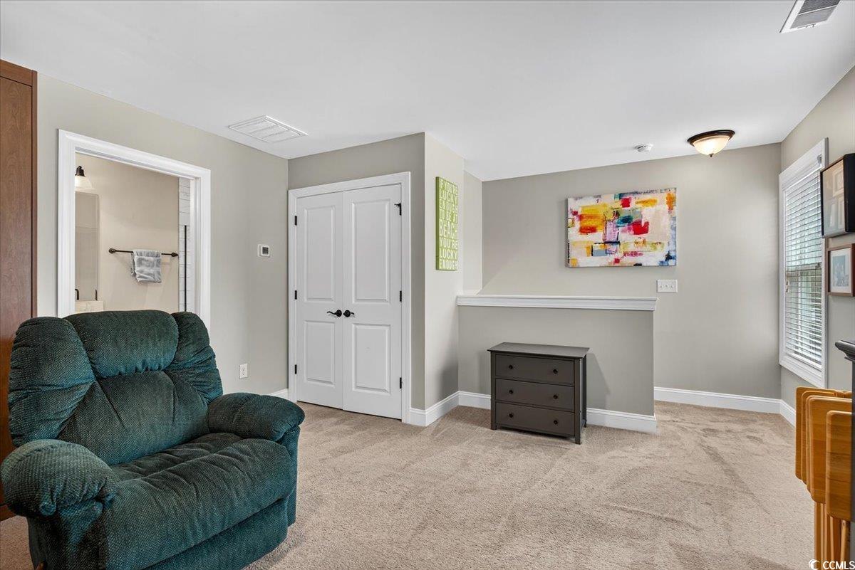 1719 Maplecress Way Myrtle Beach, SC 29577 - Photo 29 of 40 Living area featuring carpet