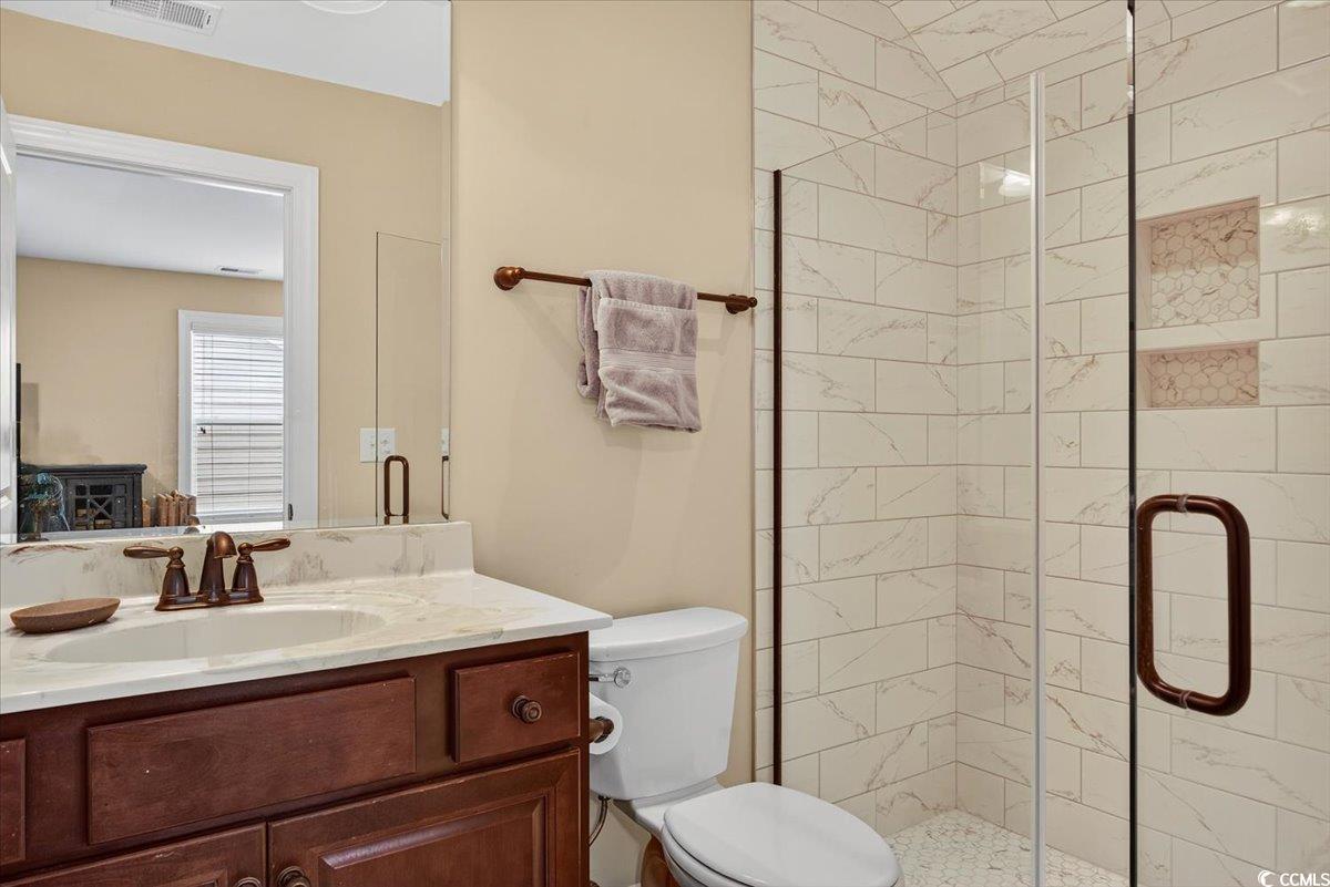 1719 Maplecress Way Myrtle Beach, SC 29577 - Photo 30 of 40 Full bathroom featuring a shower stall and vanity