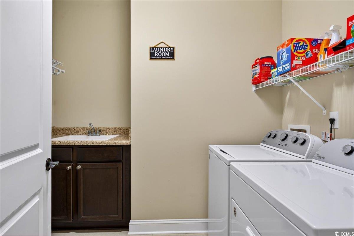 1719 Maplecress Way Myrtle Beach, SC 29577 - Photo 31 of 40 Washroom featuring independent washer and dryer and cabinet space