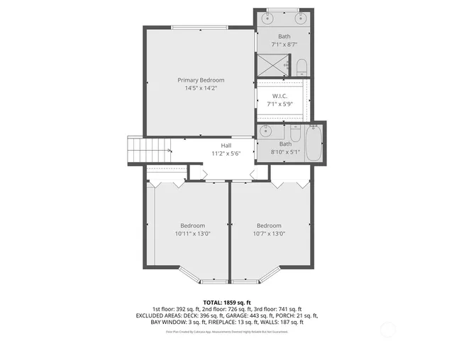 a picture of a bench in front of a wall