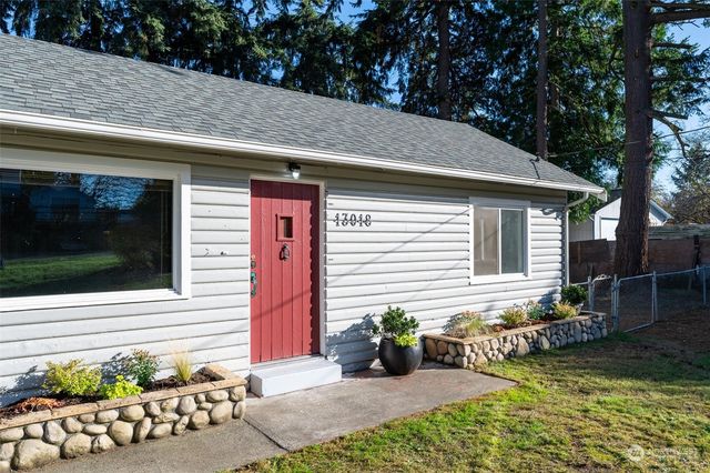 a front view of a house with patio