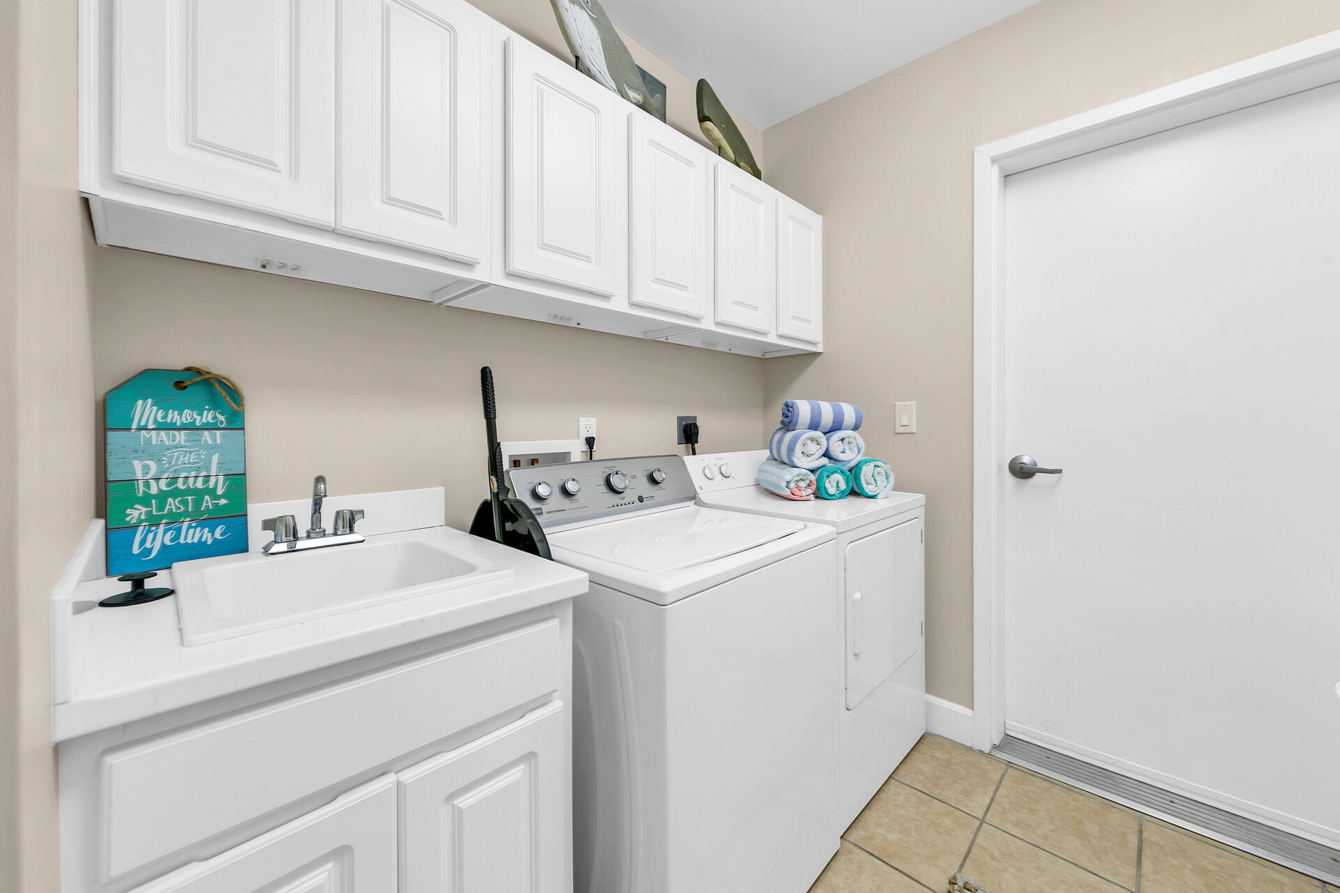 5378 Pine Ridge Lane, Unit 5378 Miramar Beach, FL 32550 - Photo 14 of 48 a utility room with dryer and washer