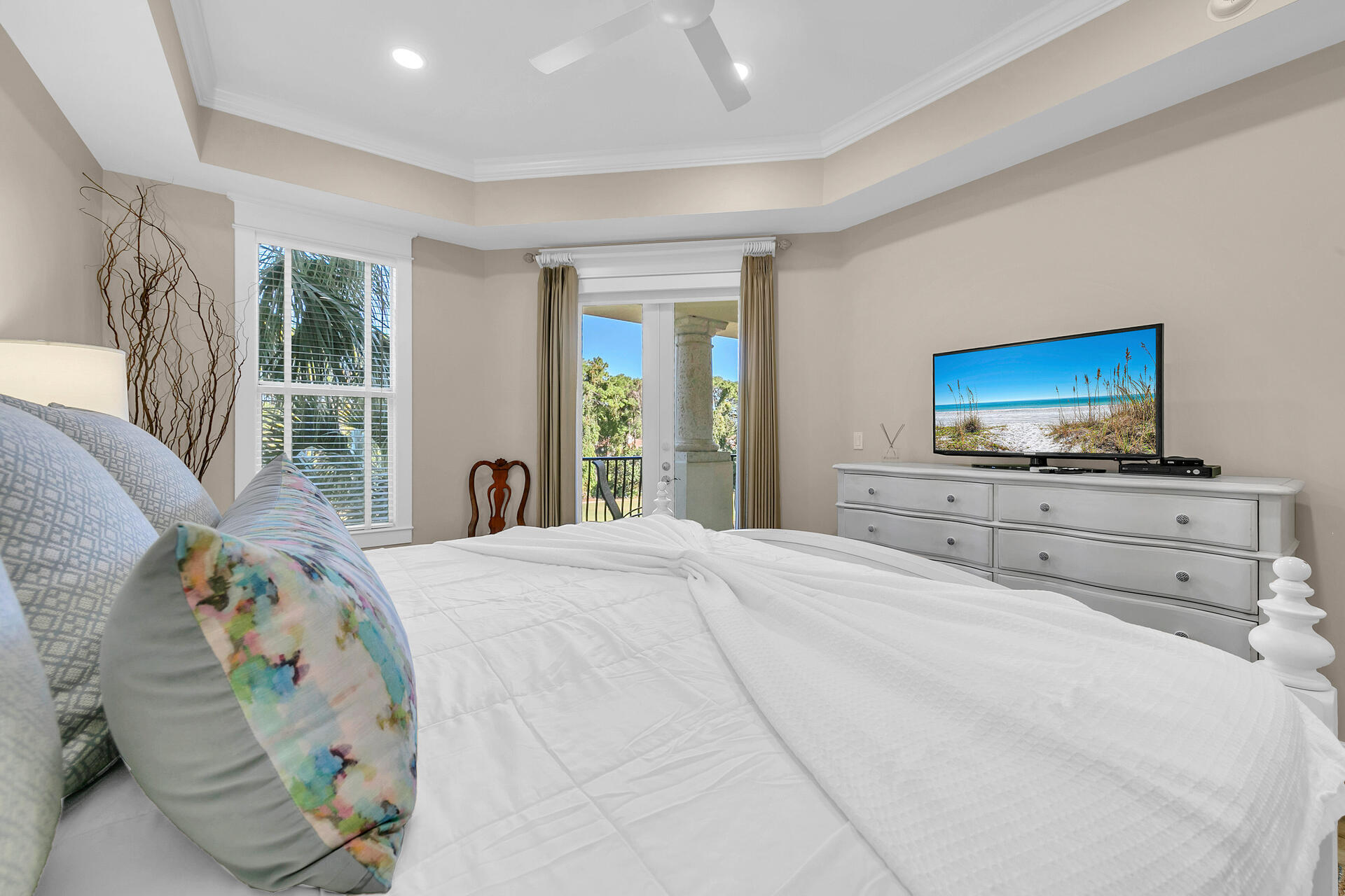 5378 Pine Ridge Lane, Unit 5378 Miramar Beach, FL 32550 - Photo 17 of 48 a bedroom with a bed and a flat screen tv