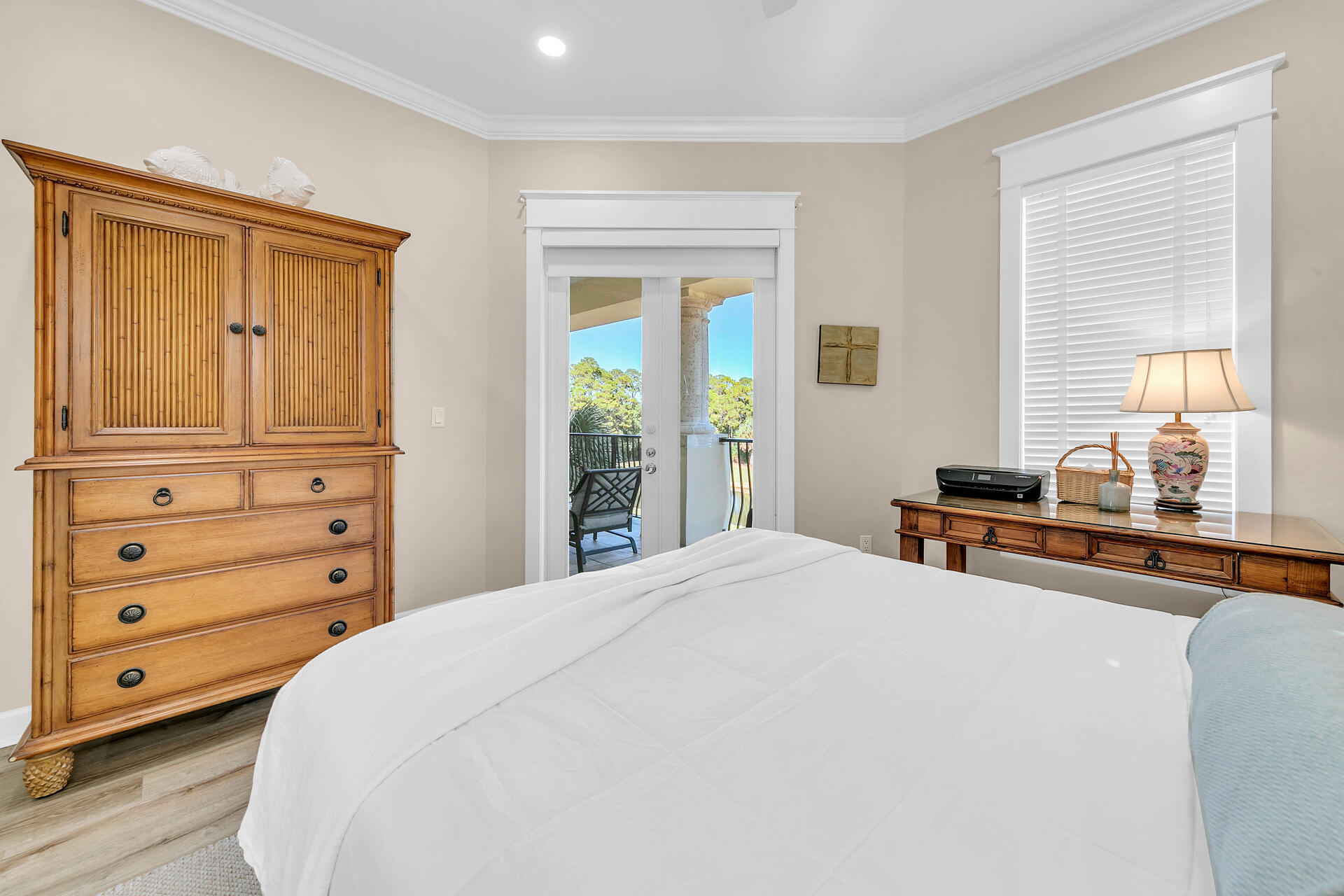 5378 Pine Ridge Lane, Unit 5378 Miramar Beach, FL 32550 - Photo 22 of 48 a bedroom with a bed and a dresser