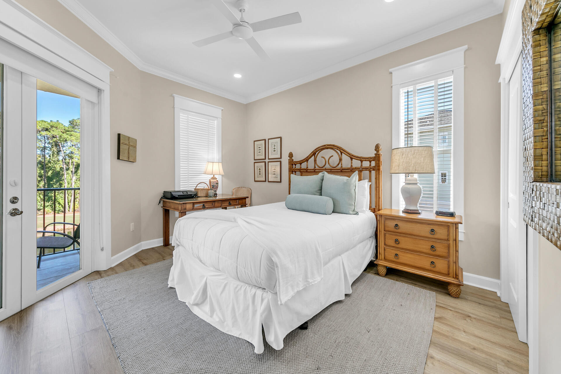 5378 Pine Ridge Lane, Unit 5378 Miramar Beach, FL 32550 - Photo 25 of 48 a bedroom with a bed and a large window