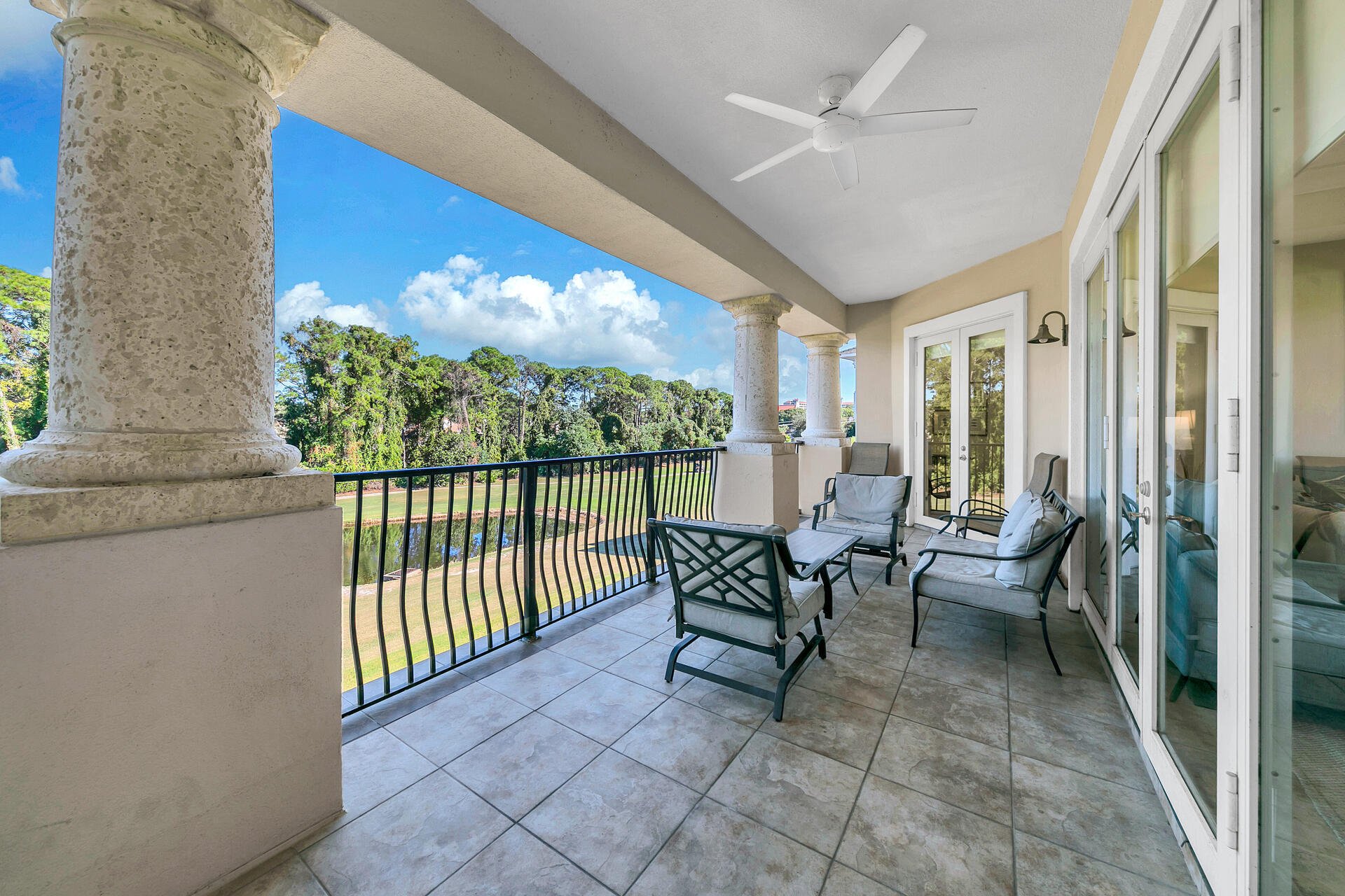 5378 Pine Ridge Lane, Unit 5378 Miramar Beach, FL 32550 - Photo 29 of 48 a view of a porch with furniture and a yard