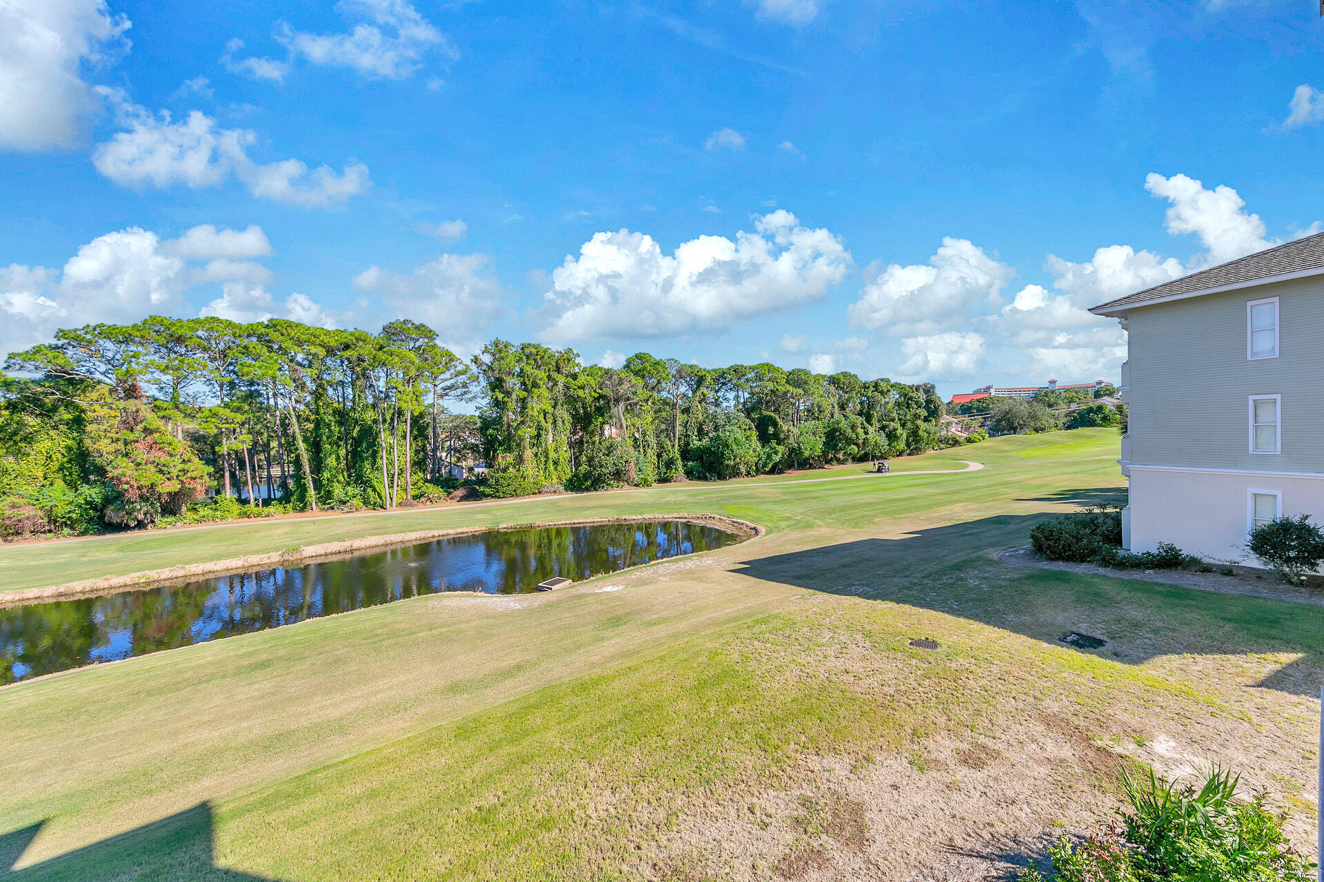 5378 Pine Ridge Lane, Unit 5378 Miramar Beach, FL 32550 - Photo 34 of 48 a view of a house with a yard