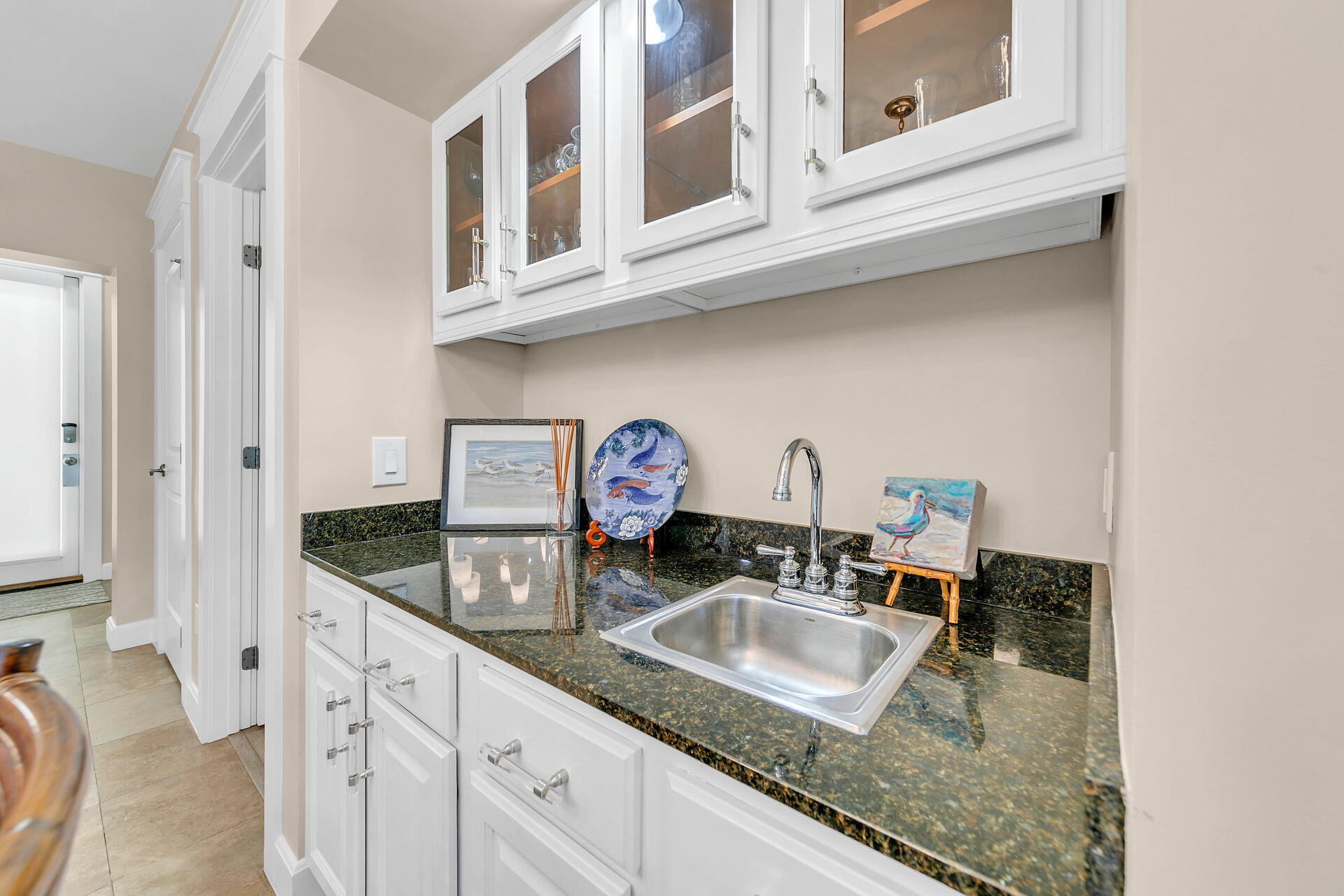 5378 Pine Ridge Lane, Unit 5378 Miramar Beach, FL 32550 - Photo 10 of 48 a kitchen with stainless steel appliances granite countertop a sink a stove and cabinets