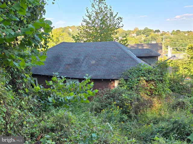 a view of a house in a garden