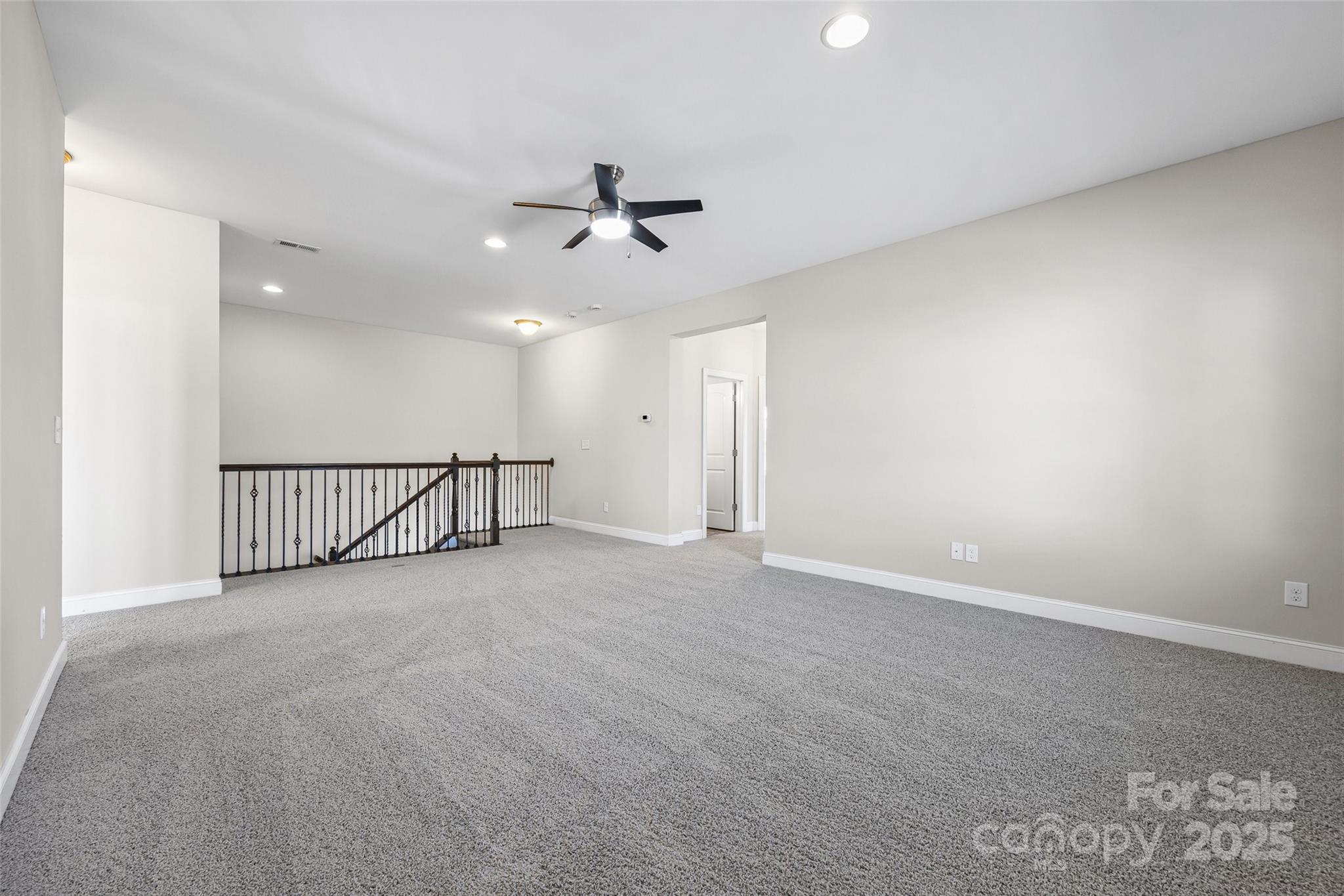 84324 Masterson Court Lancaster, SC 29720 - Photo 22 of 45 a view of a livingroom with a ceiling fan and window