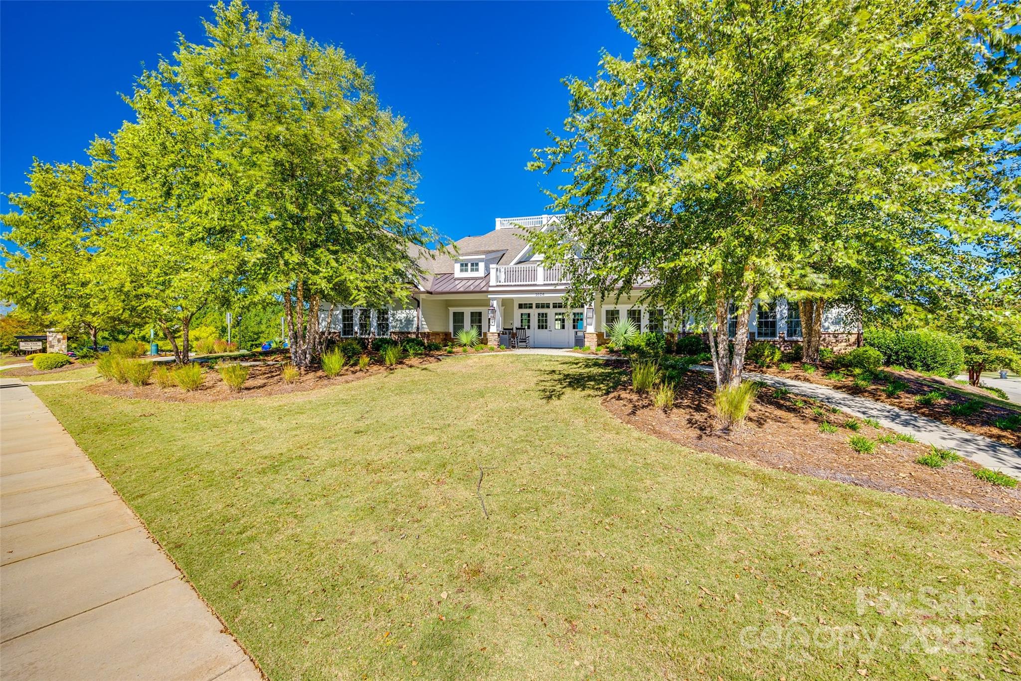 84324 Masterson Court Lancaster, SC 29720 - Photo 40 of 45 a view of swimming pool with outdoor seating and trees in the background