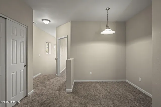 a kitchen with stainless steel appliances granite countertop a sink stove and microwave