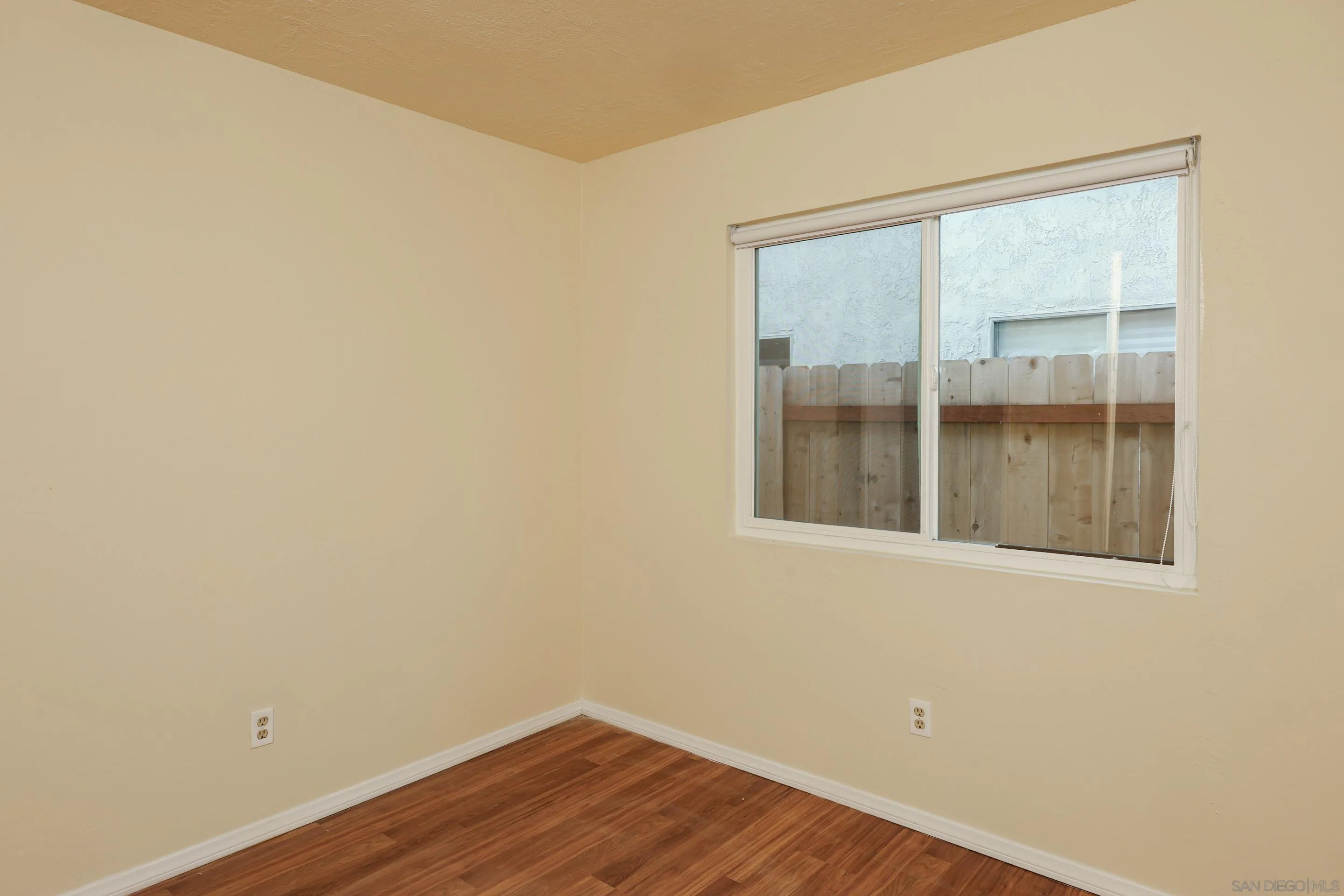 10866 Sandy Hook Road San Diego, CA 92126 - Photo 11 of 15 an empty room with a window