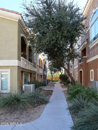 a view of a yard in front of a building