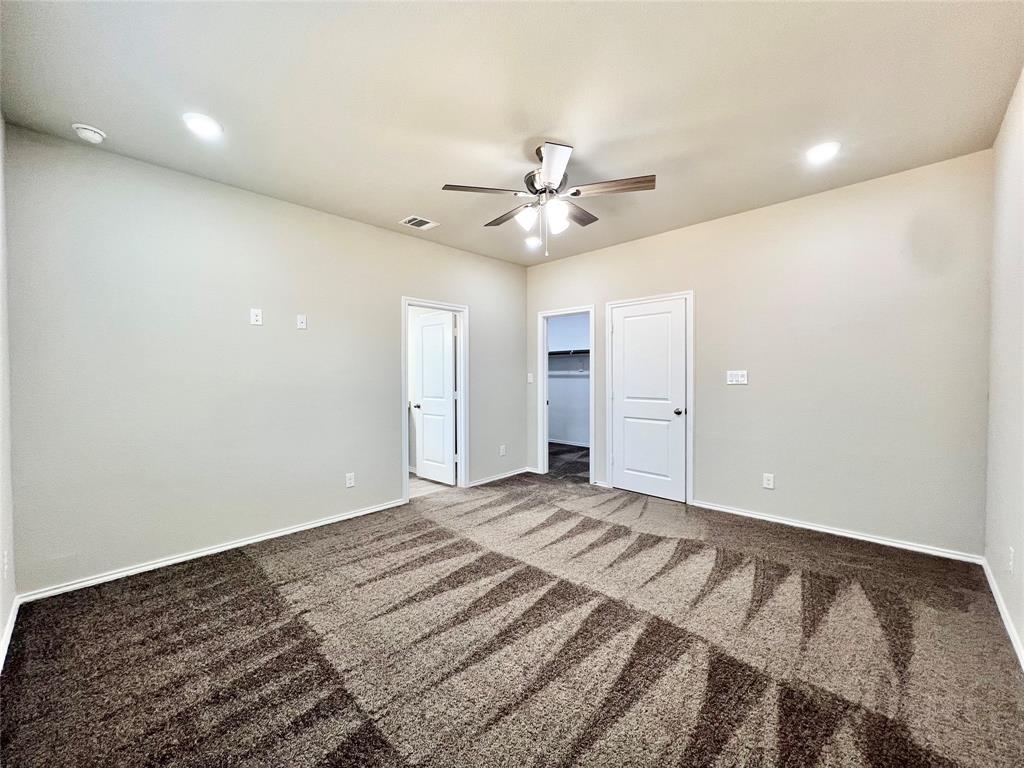 3501 East Renfro Street, Unit 202 Burleson, TX 76028 - Photo 18 of 33 a view of a livingroom with a ceiling fan