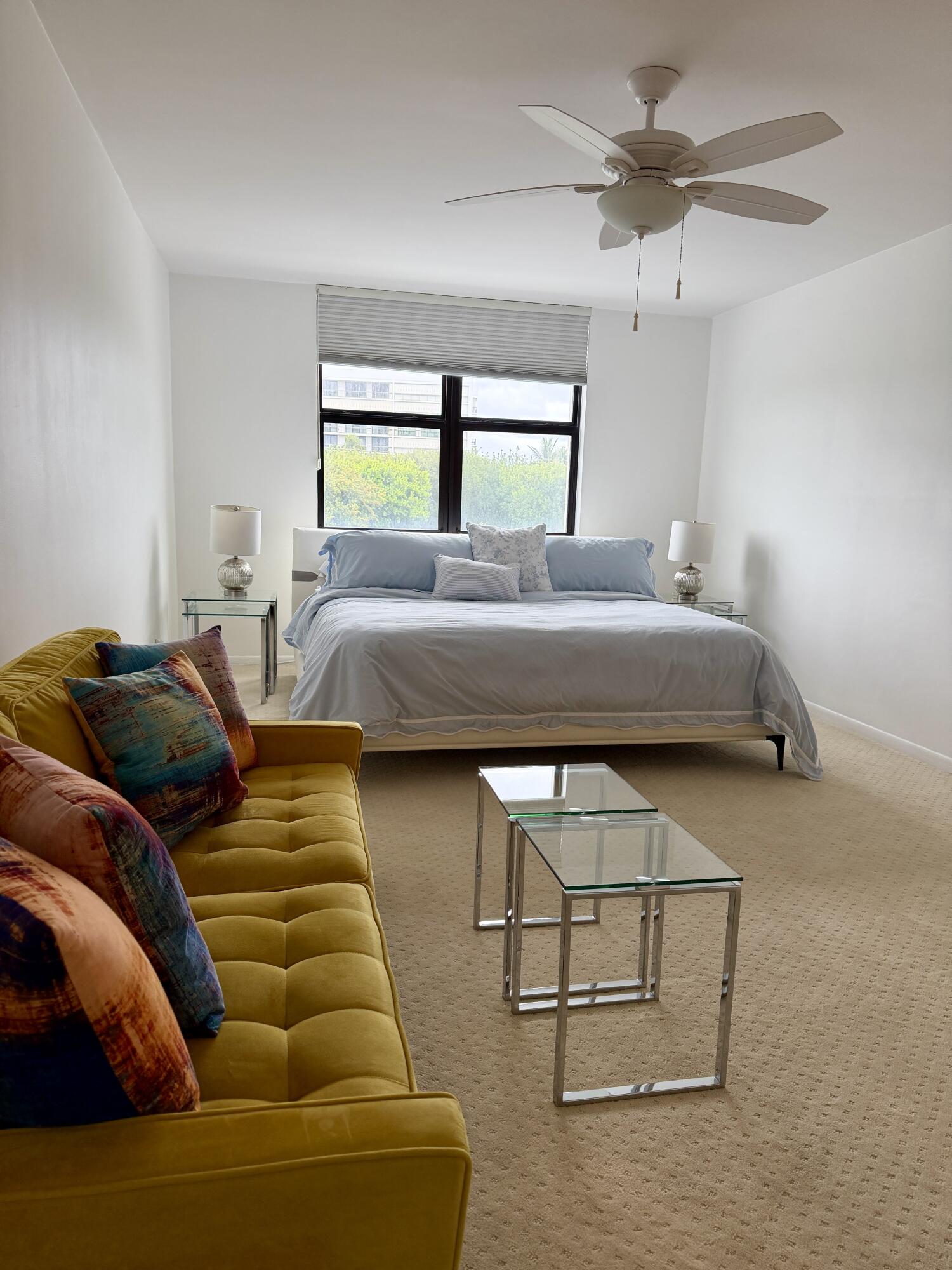 2001 North Ocean Boulevard, Unit 301 Boca Raton, FL 33431 - Photo 12 of 41 a living room with furniture and a window