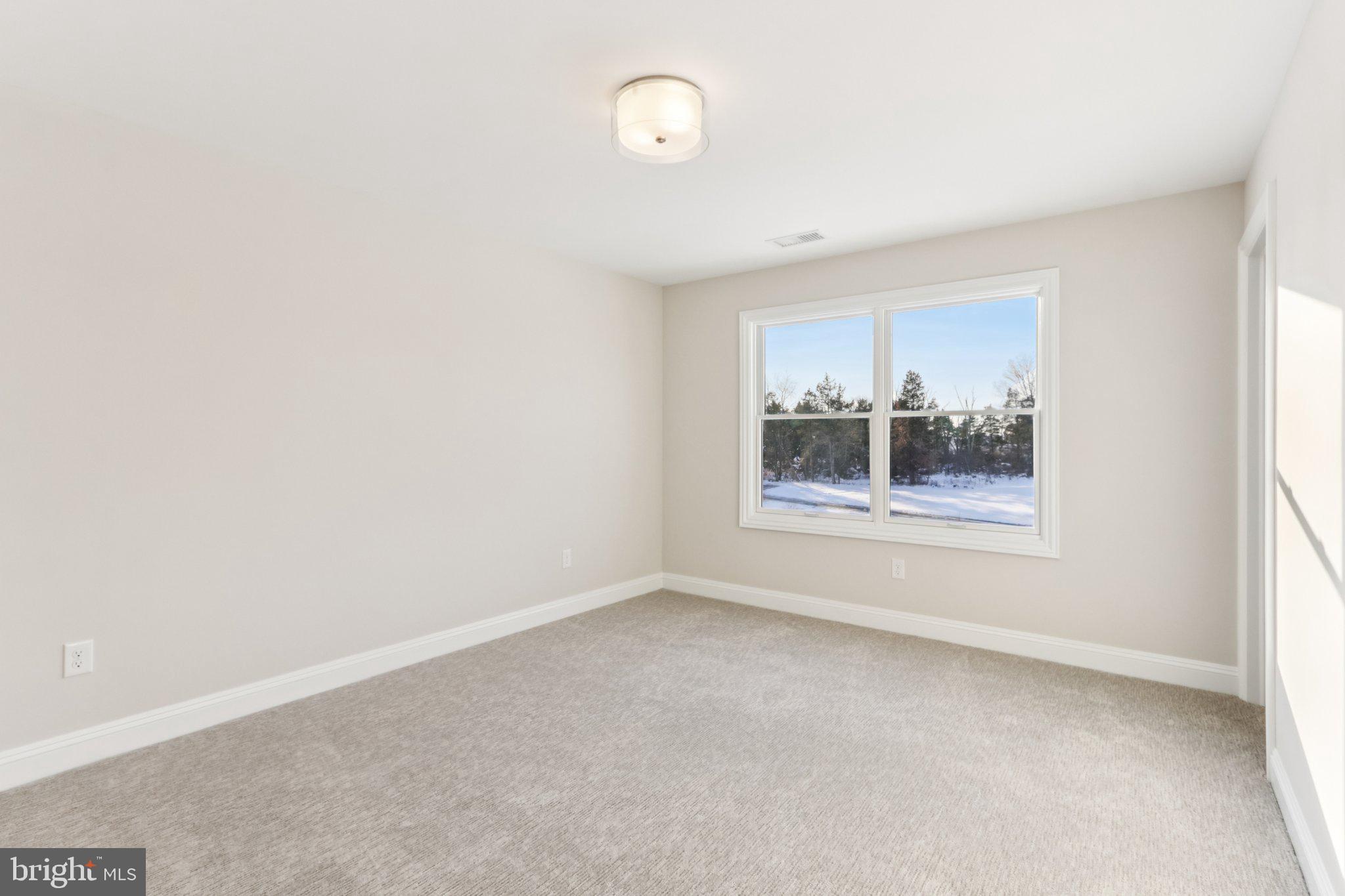 510 Newcomen Road, Unit B3D Exton, PA 19341 - Photo 61 of 74 a view of an empty room with a window