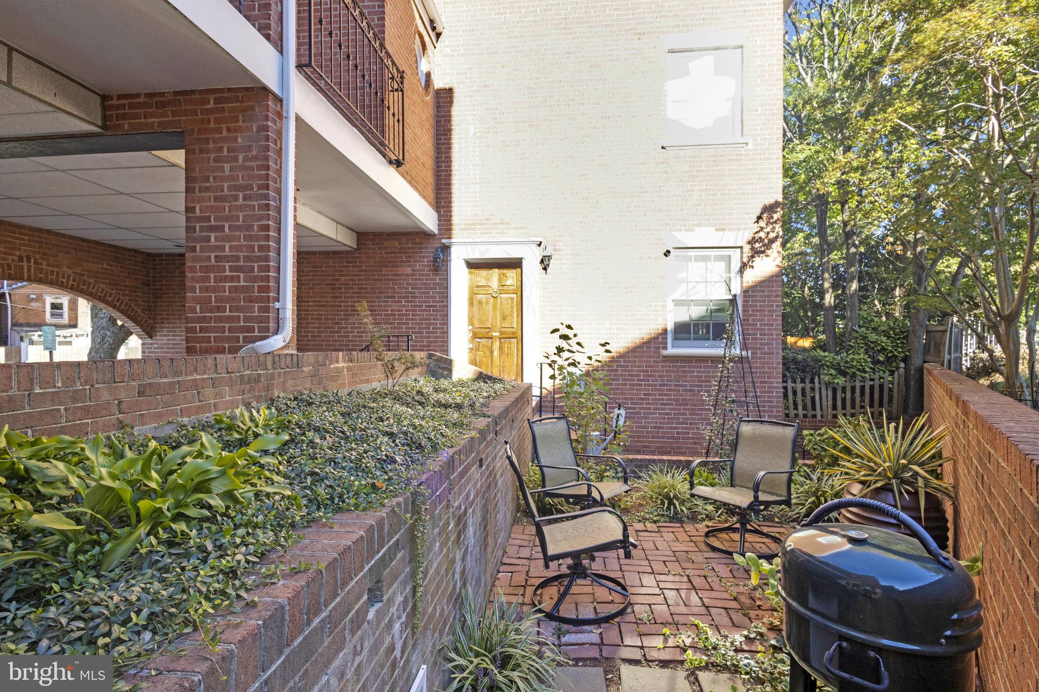116 Commerce Street Alexandria, VA 22314 - Photo 35 of 50 Charming outdoor retreat with greenery.
