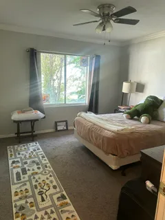 a kitchen with a stove and a refrigerator