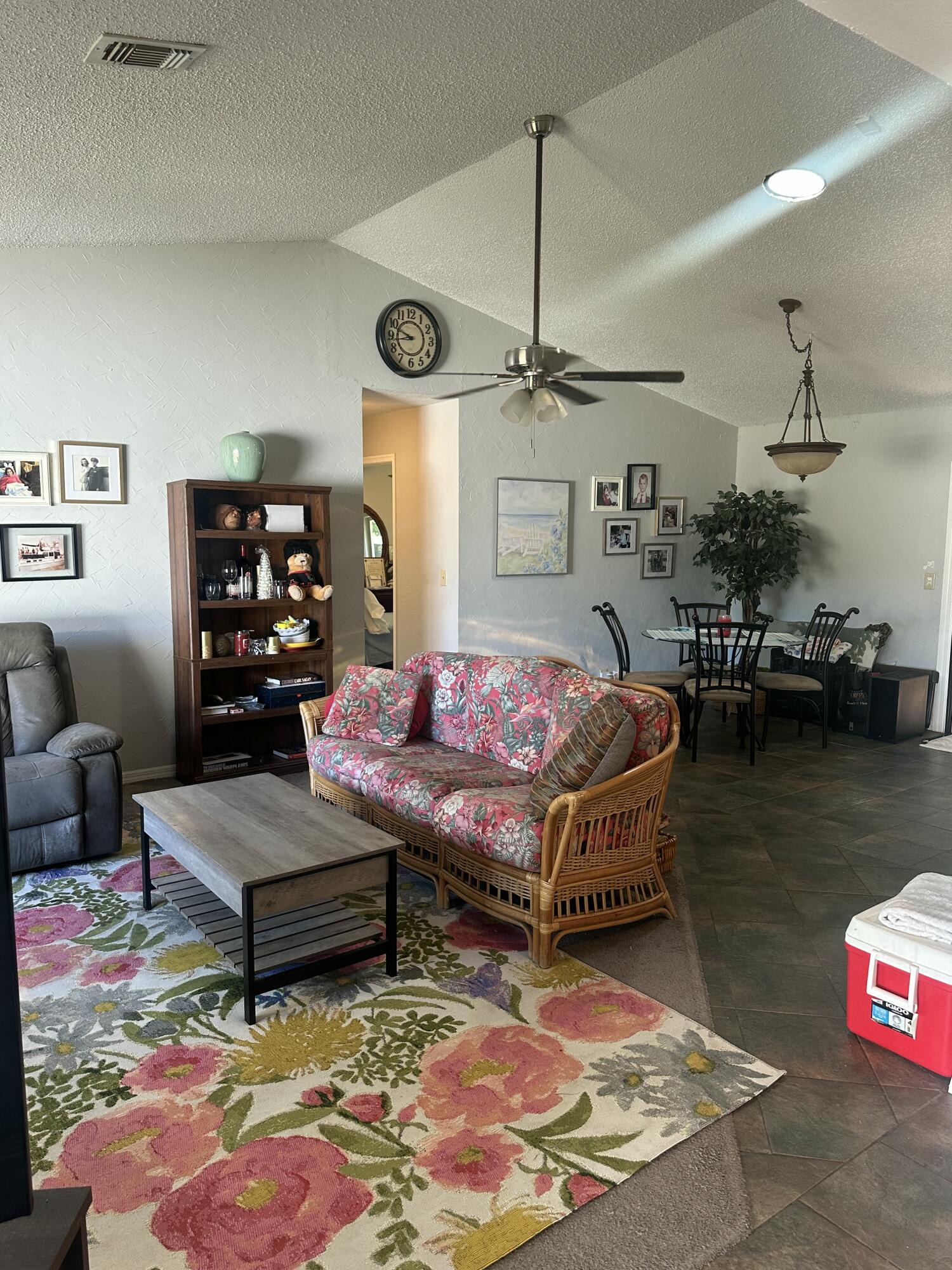 8812 Southeast Sandridge Avenue Hobe Sound, FL 33455 - Photo 5 of 22 a living room with furniture and wooden floor
