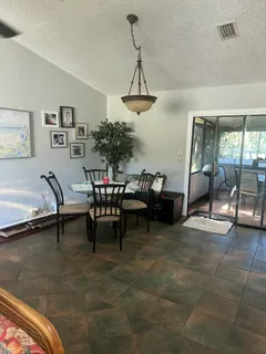 a kitchen with a sink and a refrigerator