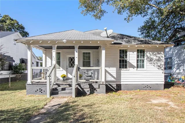 front view of a house with a patio