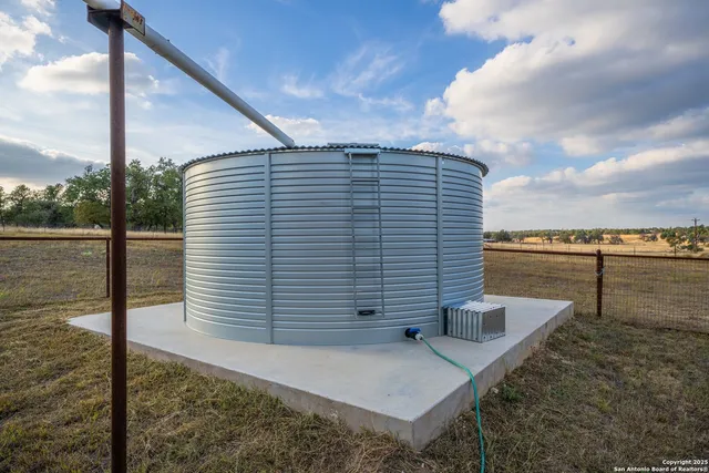 a view of a backyard of the house