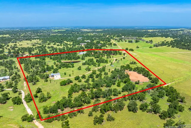a view of a city with mountains in the background