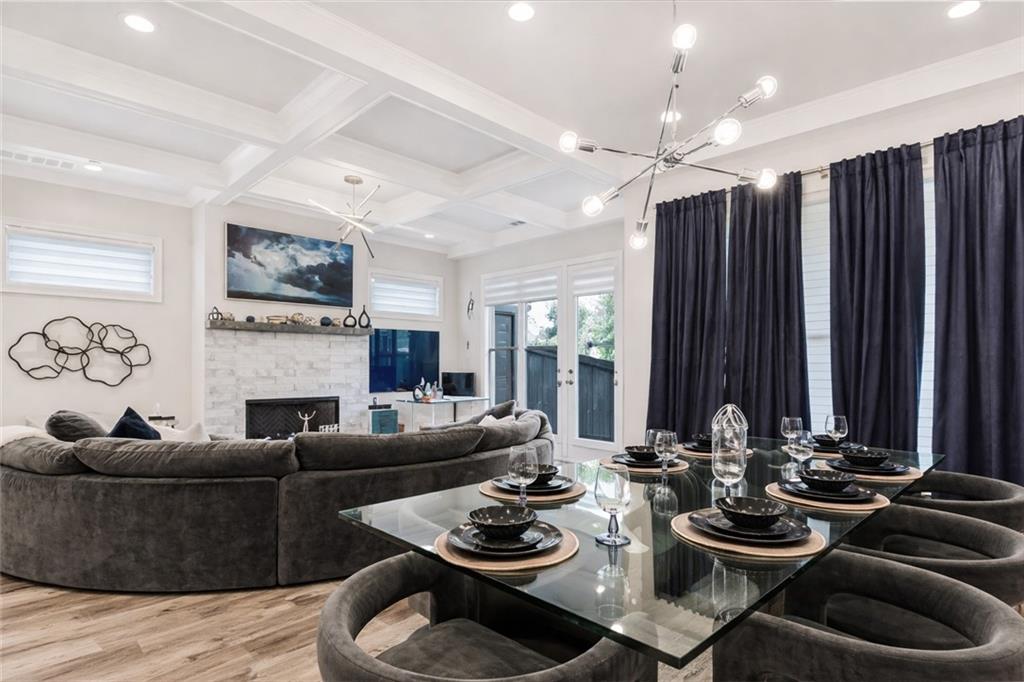 120 Via Roma Woodstock, GA 30188 - Photo 13 of 46 a living room with fireplace furniture and a fireplace