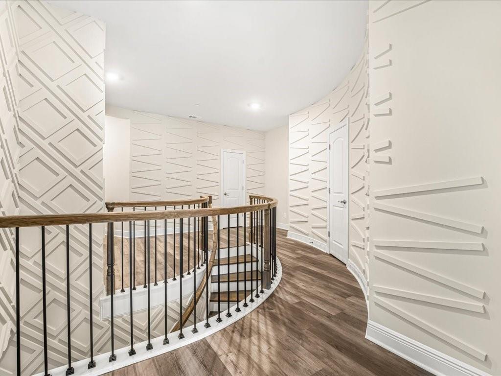120 Via Roma Woodstock, GA 30188 - Photo 20 of 46 a view of entryway with wooden floor