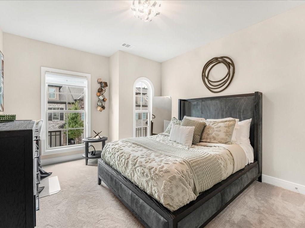 120 Via Roma Woodstock, GA 30188 - Photo 34 of 46 a bedroom with a bed and window