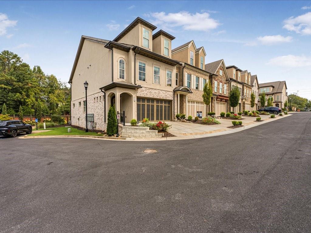 120 Via Roma Woodstock, GA 30188 - Photo 36 of 46 a front view of a building with street view