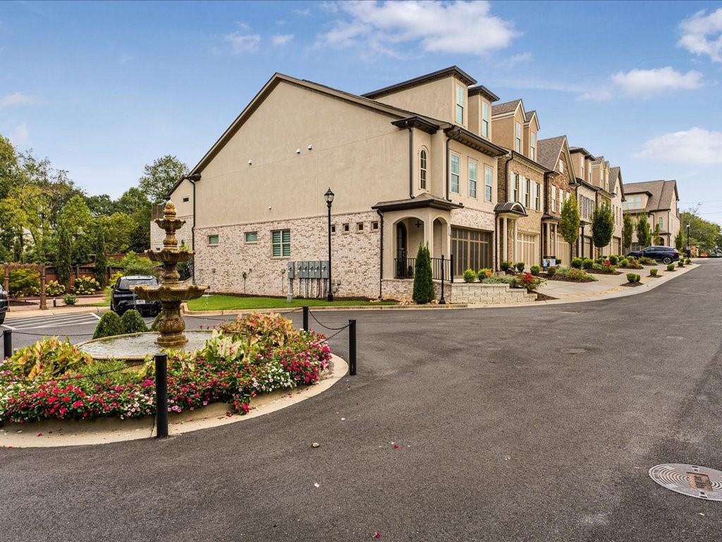 120 Via Roma Woodstock, GA 30188 - Photo 40 of 46 a view of a street with houses