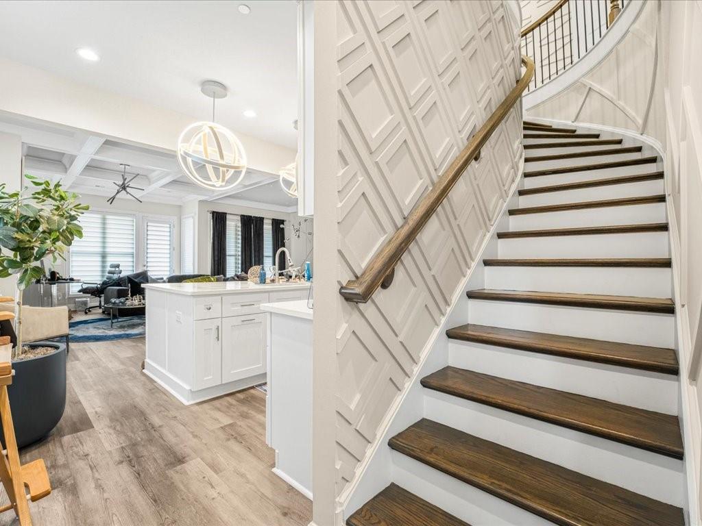 120 Via Roma Woodstock, GA 30188 - Photo 6 of 46 a view of entryway and hall with wooden floor