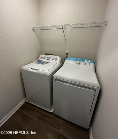 a utility room with dryer and washer