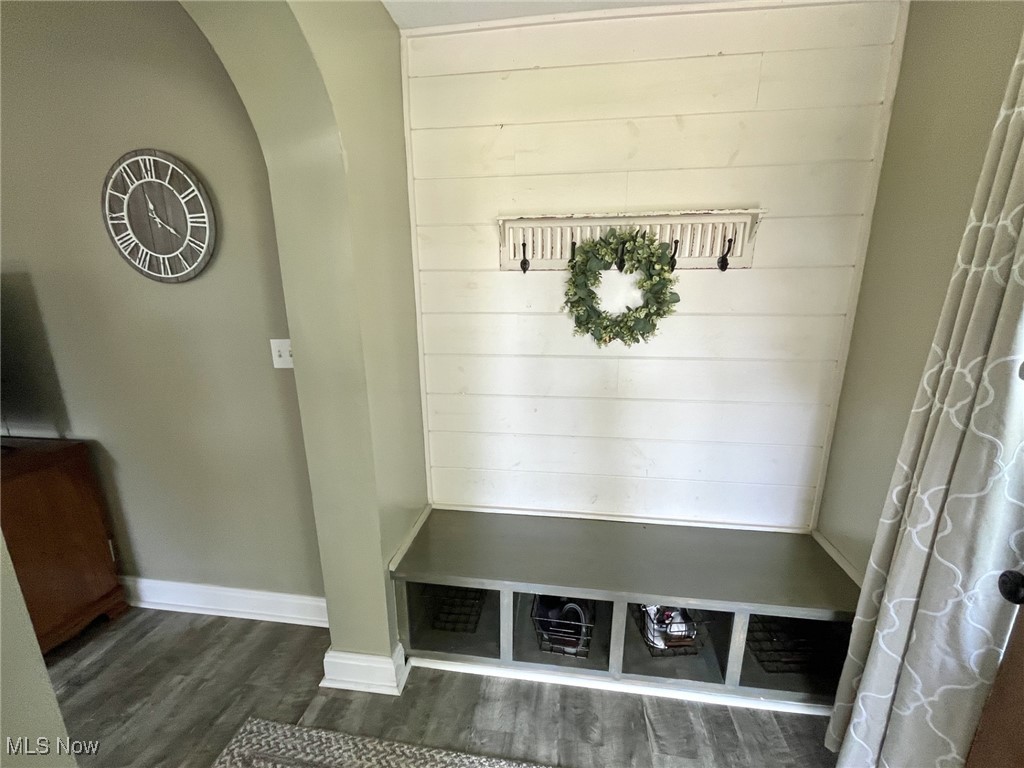 4440 Dryden Court Southwest Canton, OH 44708 - Photo 6 of 28 Mudroom with dark wood finished floors and arched walkways