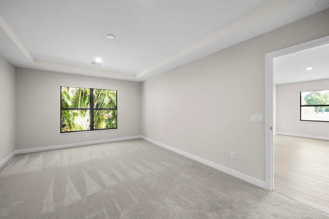 an empty room with windows